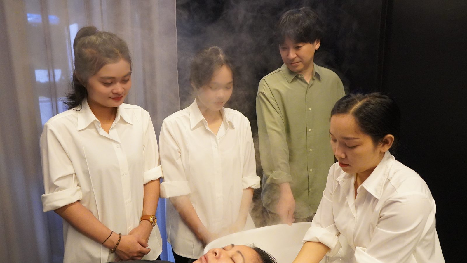 Therapists training under a Japanese instructor