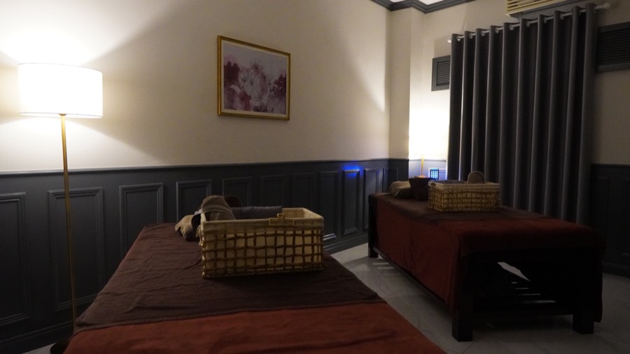 The softly lit aroma treatment room